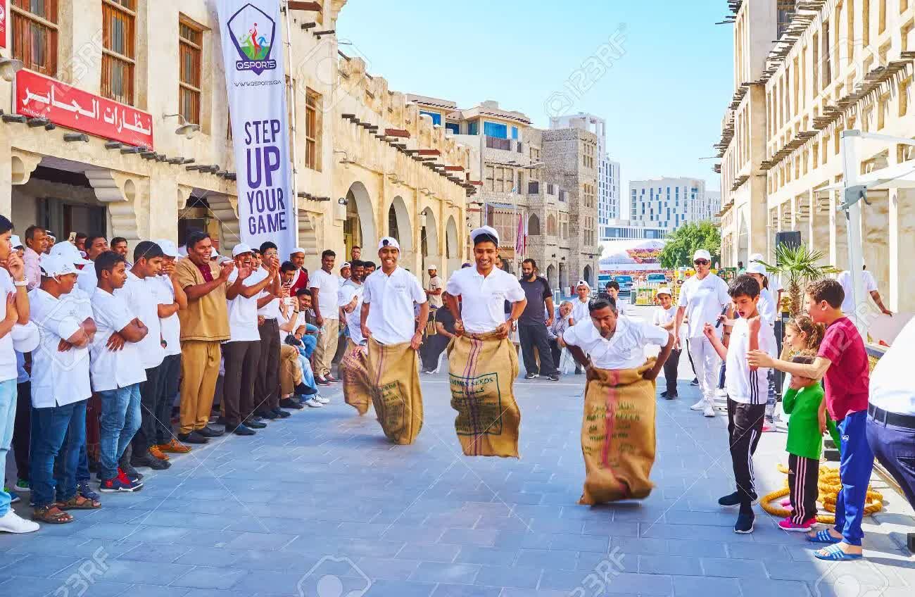 99672577-doha-qatar-february-13-2018-the-sack-race-in-street-of-souq-waqif-people-celebrate-the-day-of-sport--1668398891758488479220.jpg