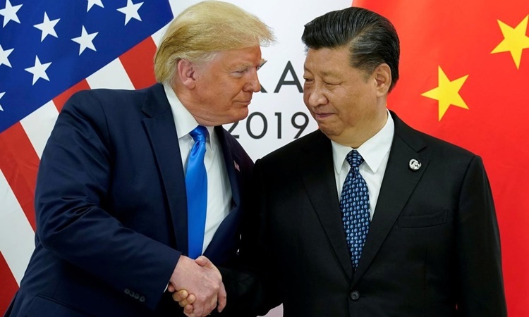 Tổng thống Mỹ Donald Trump và Chủ tịch Trung Quốc Tập Cận Bình tại hội nghị thượng đỉnh G20 ở Nhật hồi tháng 6. Ảnh: Reuters.