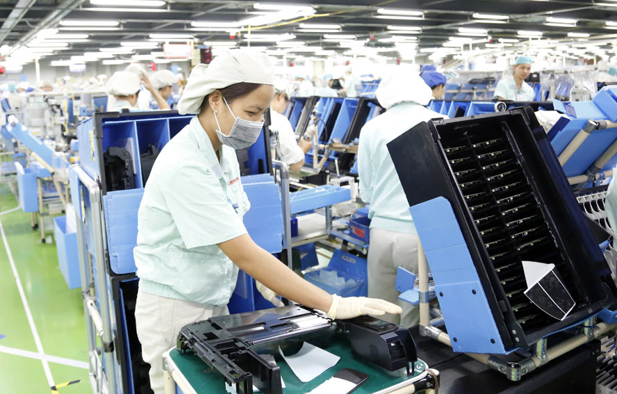 Sản xuất máy in tại Công ty Canon Việt Nam, Khu công nghiệp Thăng Long (Hà Nội).