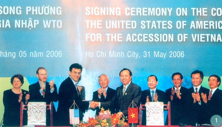 Ngày 31/5/2006, tại TP. Hồ Chí Minh, Thứ trưởng Bộ Thương mại Lương Văn Tự ký Hiệp định gia nhập WTO với ông Karan Bhatia - Phó đại diện thương mại Hoa Kỳ