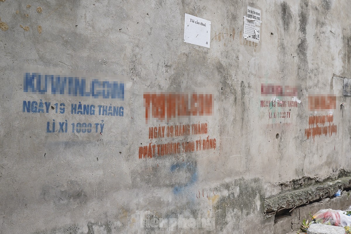 Online betting and gambling advertisements appear everywhere in Hanoi photo 1